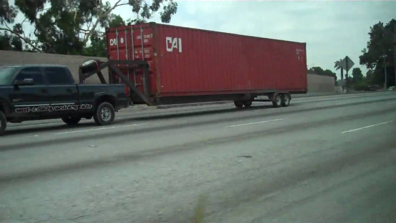 Chevy 5th wheel pulling a container - YouTube