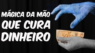 Mágica da mão que cura dinheiro