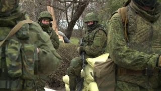 Russian forces take over Crimean military bases