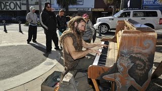 Busking piano goes with him on the road