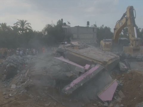 Bulldozers and rescue crews were clearing rubble on Monday from a building in southern Gaza that was hit by an Israeli airstrike on Sunday evening, killing 25 members of the same family, according to Palestinian health officials. (July 21)

Subscribe for more Breaking News: http://smarturl.it/AssociatedPress
Get updates and more Breaking News here: http://smarturl.it/APBreakingNews

The Associated Press is the essential global news network, delivering fast, unbiased news from every corner of the world to all media platforms and formats.
AP\'s commitment to independent, comprehensive journalism has deep roots. Founded in 1846, AP has covered all the major news events of the past 165 years, providing high-quality, informed reporting of everything from wars and elections to championship games and royal weddings. AP is the largest and most trusted source of independent news and information.
Today, AP employs the latest technology to collect and distribute content - we have daily uploads covering the latest and breaking news in the world of politics, sport and entertainment. Join us in a conversation about world events, the newsgathering process or whatever aspect of the news universe you find interesting or important. Subscribe: http://smarturl.it/AssociatedPress

http://www.ap.org/
https://plus.google.com/+AP/
https://www.facebook.com/APNews
https://twitter.com/AP