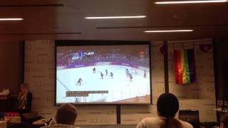 Students at George Brown College react as Canada wins gold in women's hockey