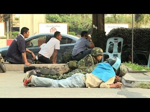 Violence erupted in Bangkok on Saturday, the eve of tense Thai elections, with explosions and heavy gunfire breaking out in clashes between pro- and anti-government protesters. Duration: 00:43