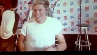 Niall Horan & Louis Tomlinson being extremely cute and Niall showing off his 'guns'