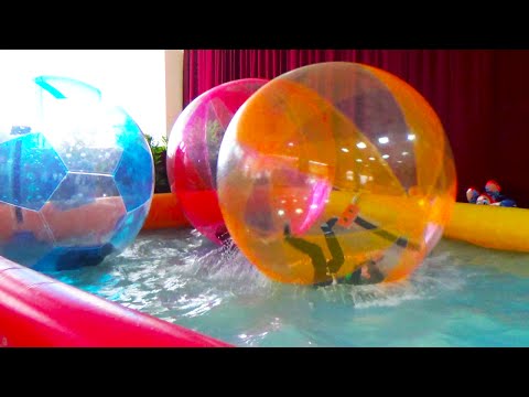 Giant WATER BALLS in a pool - Fun activities for Kids and Toddlers