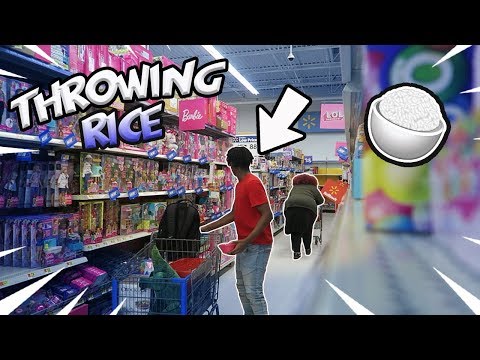 Throwing Rice at Strangers Prank in Walmart!!!!!