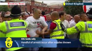 English Defence League anti-Islamist march: EDL supporters clash with police in Birmingham