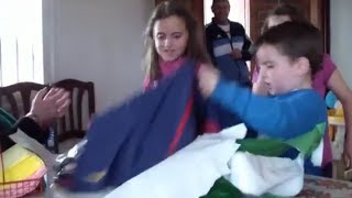 When a Real Madrid Kid Fan Receives a Barcelona Jersey For His Birthday !