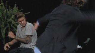 Justin Bieber whipped with belt by Zach Galifianakis in Funny or Die sketch