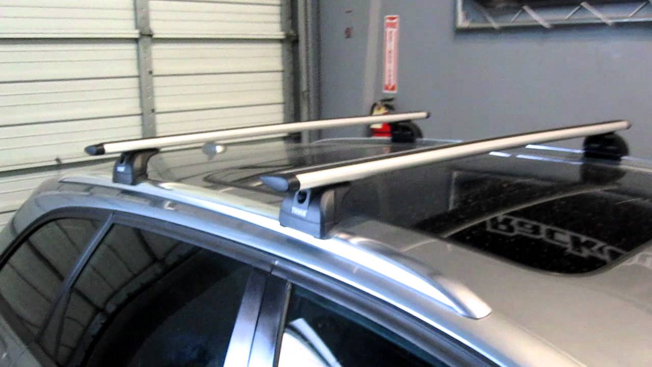 audi a4 avant with thule 460r aeroblade base roof rack by