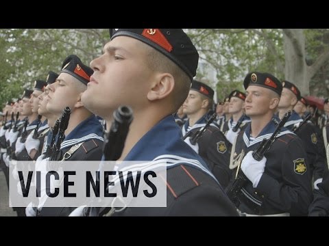 Subscribe to VICE News here: http://bit.ly/Subscribe-to-VICE-News

On Friday, May 9, President Vladimir Putin of Russia visited Crimea for the first time after its annexation. He arrived at the Crimean port city Sevastopol during the Victory Day celebrations commemorating the triumph over Nazi Germany in World War II with a massive parade of Russian troops and veterans. The annual festivities quickly turned into a festival of Russian rule and a show of military power.

Read more on vicenews.com:
https://news.vice.com/article/in-photos-bloody-clashes-overshadow-victory-day-in-eastern-ukraine

Watch all of VICE News\' coverage of the conflict in Ukraine here: https://www.youtube.com/playlist?list=PLw613M86o5o7DfgzuUCd_PVwbOCDO472B

Check out the VICE News beta for more: http://vicenews.com

Follow VICE News here:
Facebook: https://www.facebook.com/vicenews
Twitter: https://twitter.com/vicenews
Tumblr: http://vicenews.tumblr.com/