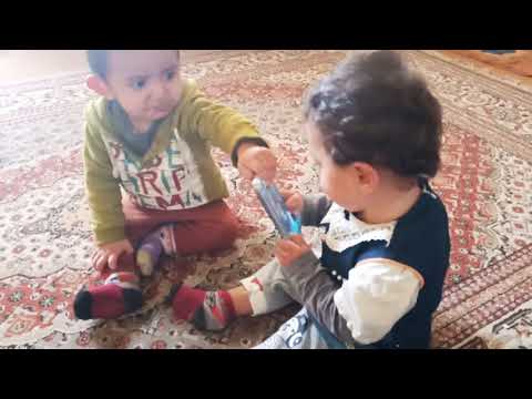 Twins baby fighting for mobile - Cute baby's funny