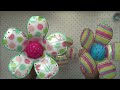 FLORES HECHAS CON BOTELLAS PET CUBIERTAS CON TELA .- PET FLOWERS