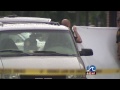 Dead suspect's girlfriend speaks in his defense