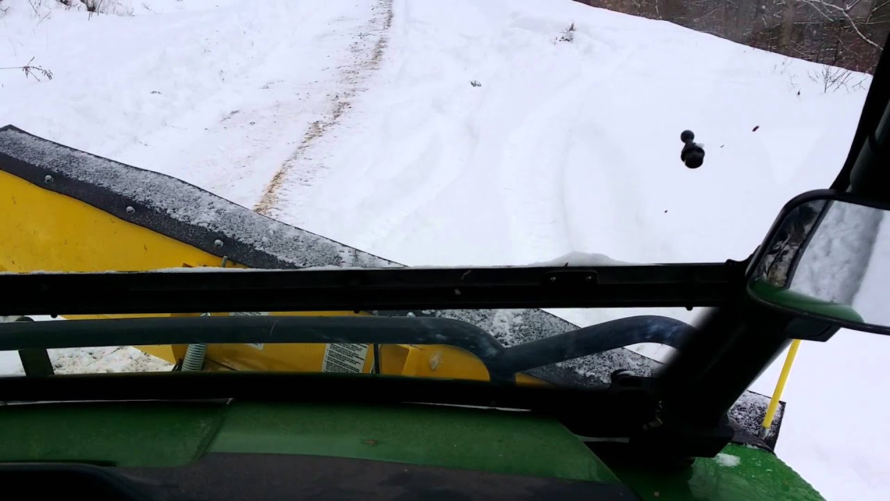 John Deer Gator 825i plowing snow YouTube