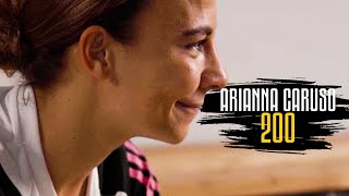 Arianna Caruso reacts to her teammates' messages after 200 games in black&white