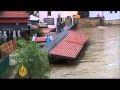 Authorities in parts of central Europe issued disaster warnings and scrambled to reinforce flood defences on Sunday as rivers swelled by days of heavy rain threatened to burst their banks. Several people have died or are missing in the floods in Germany, the Czech Republic and Switzerland since the rains began on Thursday.  Al Jazeera\'s Phil Lavelle reports.