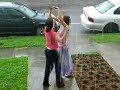 two girls singing in the rain in new orleans
