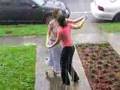 two girls singing in the rain in new orleans