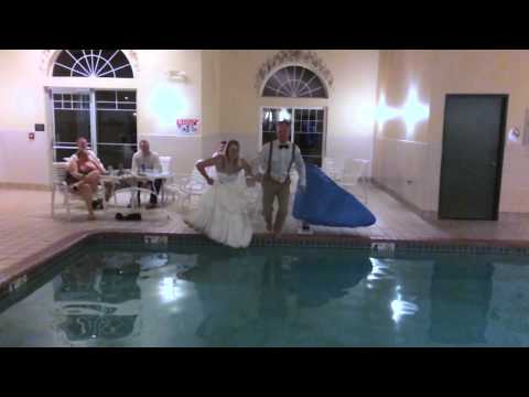 Bride and Groom Jump Into A Pool