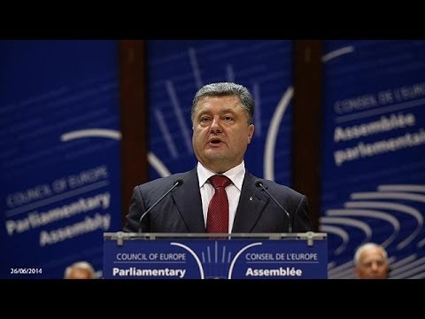 Ukrainian President Petro Poroshenko is due to sign a long-awaited association agreement with the European Union on Friday.

It was the decision by Ukraine\'s former leader Viktor Yanukovych to renounce a deal last year and turn to Russia that triggered the revolution leading to today\'s conflict in the east.

The economic part of the accord due to be signed in Brussels aims to establish a free-trade area. 

Greeted by supporters earlier in Strasbourg, Poroshenko said:
\