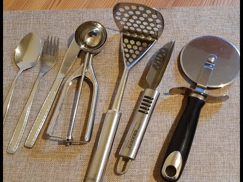 Few utensils in the kitchen translated to German language.