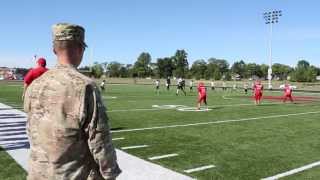 SSgt. Brandon Pickett surprises son, Jayce, at Ed Loeb Field.