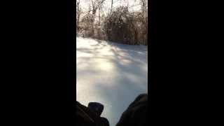 Sledding in a laundry basket