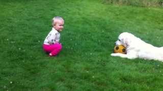 Baby talks to dog