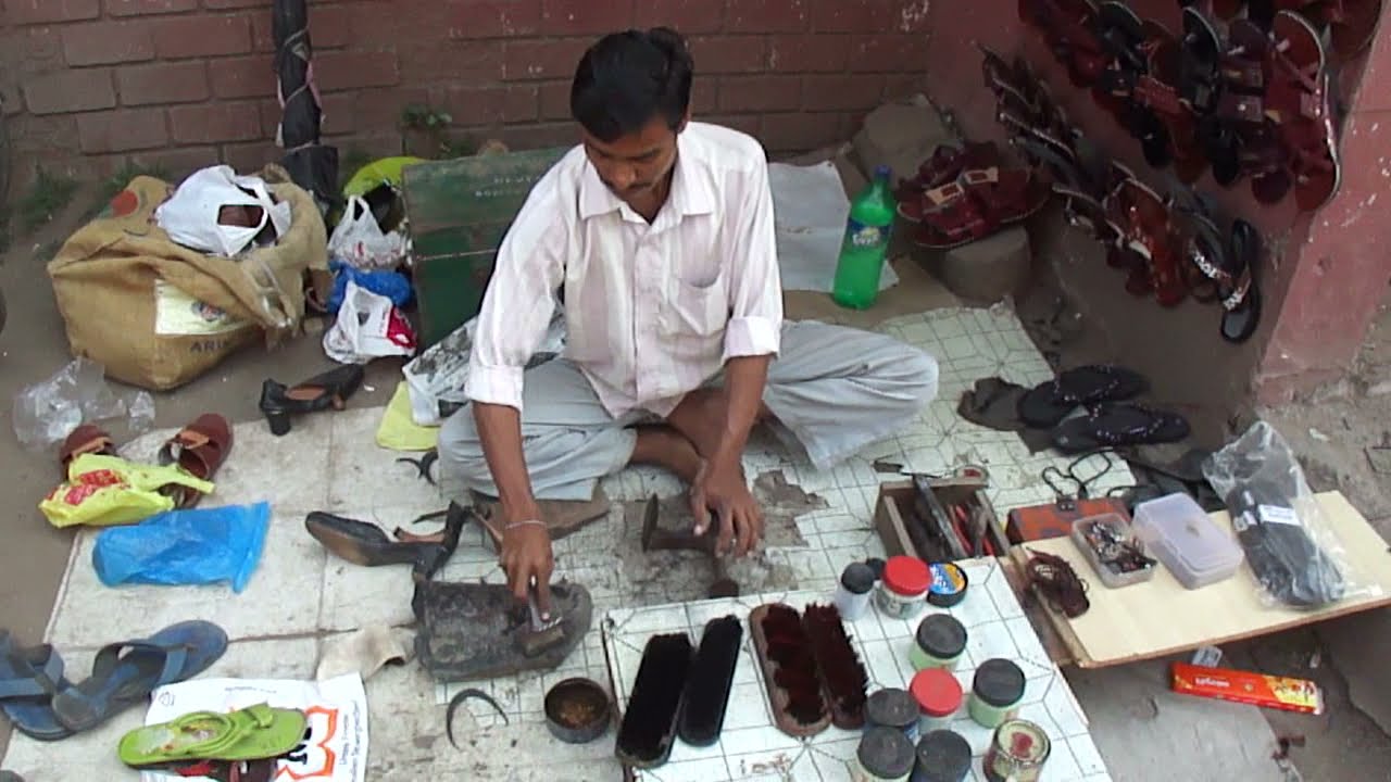 Navsari roadside Cobbler (shoe & sandal repairer) 14th February 2011