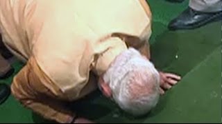 Narendra Modi bows down, touches the steps of Parliament