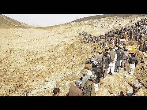 A day after a huge landslide in the northern Afghan province of Badakhshan, local residents continue to dig through the rubble to search for survivors. 

But hope is fading of finding anyone alive amongst the rock and mud, which is 30 metres deep in places.

A spokesman for the Badakhshan provincial governor told reporters that 2,100 people had been trapped that all were believed to have died.

A local man, who helped to retrieve several bodies, told reporters, \