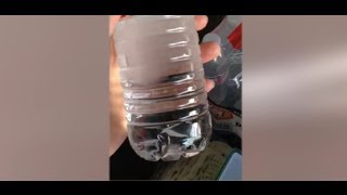 Bottle of water freezes in Chiberia before your very eyes