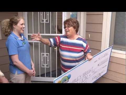 Shirley Bright $1,000,000 Second-Chance Drawing Winner - Shirley entered her non-winning scratch cards online and won the $1,000,000 Second Chance Drawing yesterday. We stopped by to surprise her with a BIG CHECK. She is going to pay off some bills and put her grandchildren through college with her winnings.