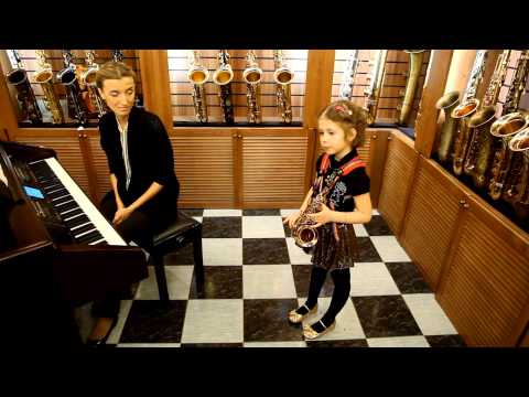 Santa Lucia played on saxophone by a 7 years old girl