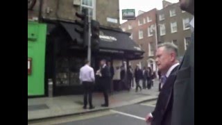 Minister Howlin Tries to grab camera from a member of Dublin Says NO