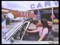 Girl in convertible at the car wash