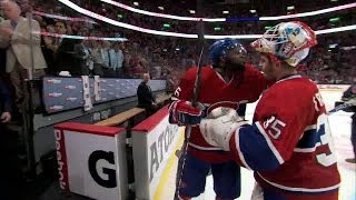 P.K. Subban lays a kiss on Dustin Tokarski