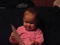 baby dunya is reading ( beba dunja sa knjigom ( dunya with a book))