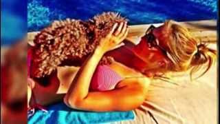 Bar Refaeli Wows in a Pink Bikini While Cuddling Her Dog