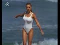 pamela anderson in white one piece swimsuit