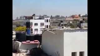 Israel Mortar Hitting Roof of Gaza Building To Warn of imminent Israeli Strike