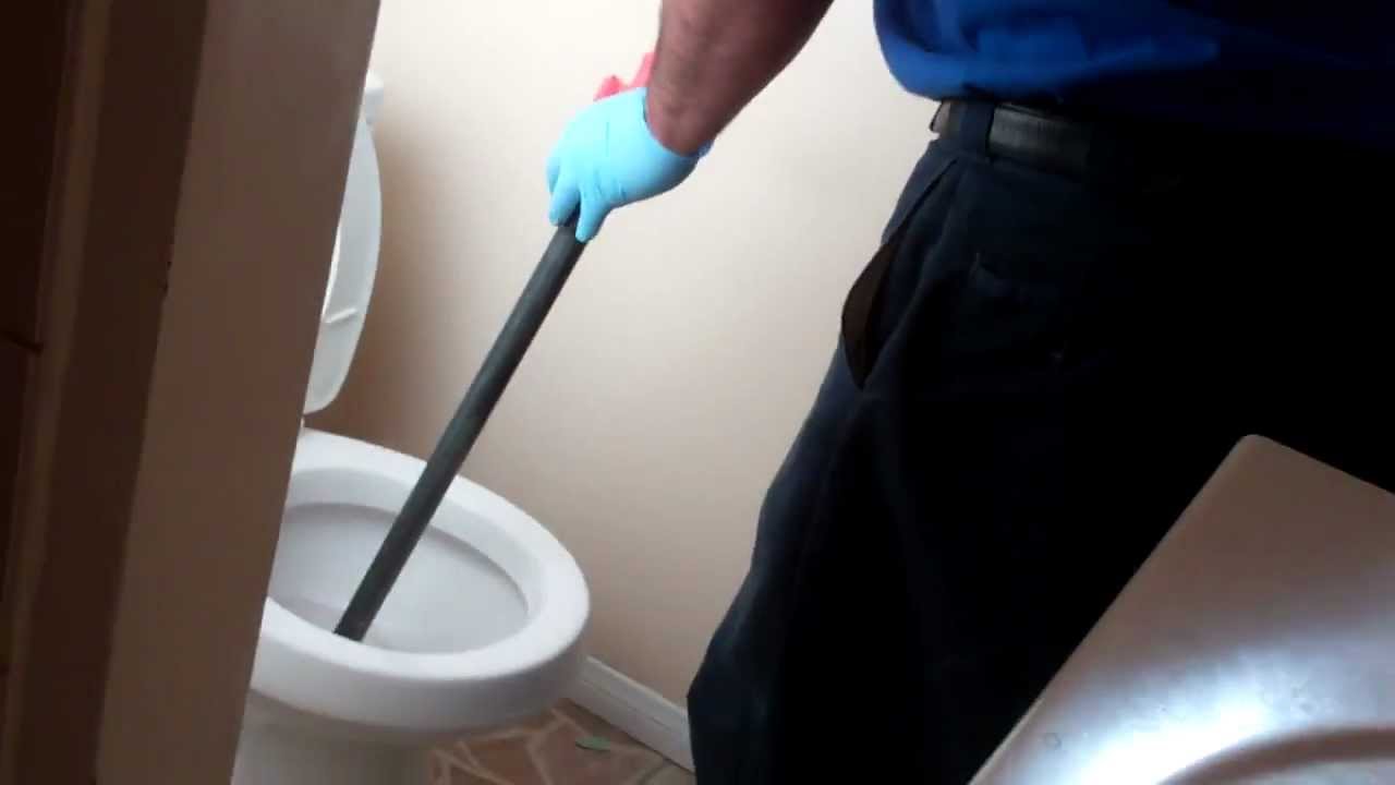how to unclog a toilet with a toilet auger YouTube