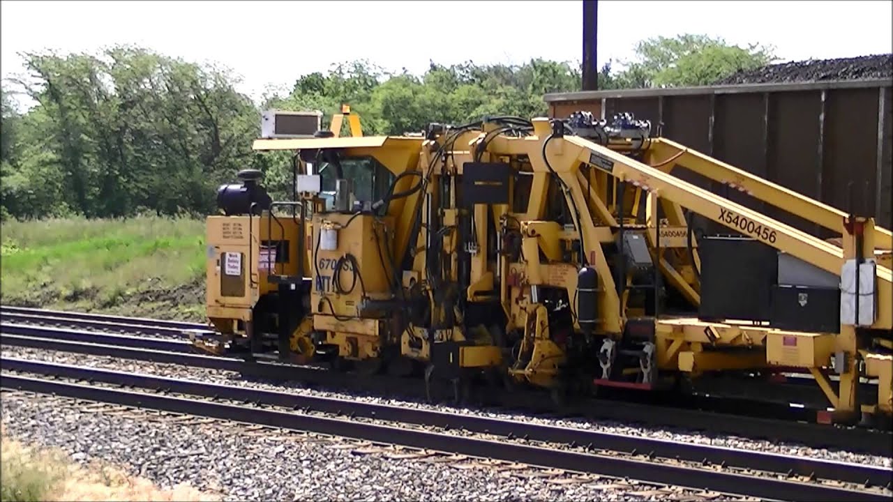 BNSF ballast tamper at work YouTube