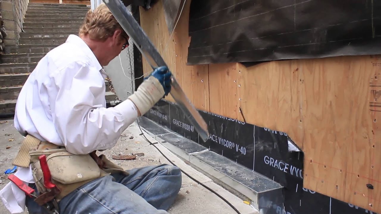 Waterproofing the cement curb next to exterior wall sheathing - YouTube