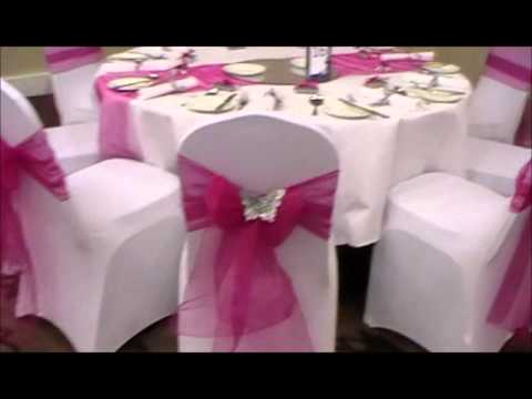 Decorations include white lycra chair covers cadburys organza sash 