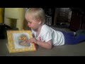 Funny Baby Reading a Book