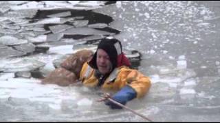 Raw: Firefighters Rescue Family Dog in Icy River