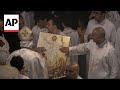 Egypts Coptic Christians flock to churches to attend mass marking beginning of their Easter