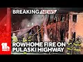 Fire spreads to multiple rowhomes on Pulaski Highway